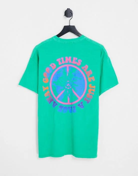 oversized T-shirt in green with good times print