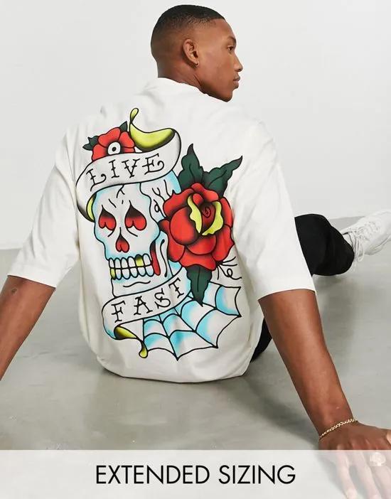oversized T-shirt in off-white with tattoo skull back print