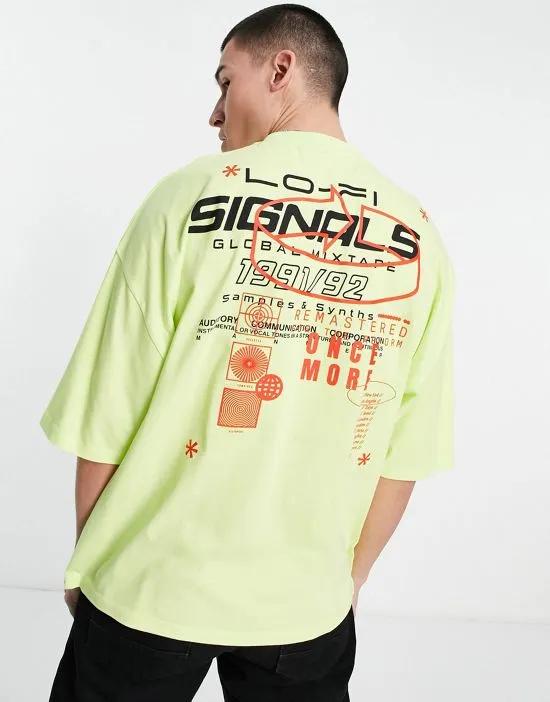 oversized T-shirt in yellow with street back & chest print