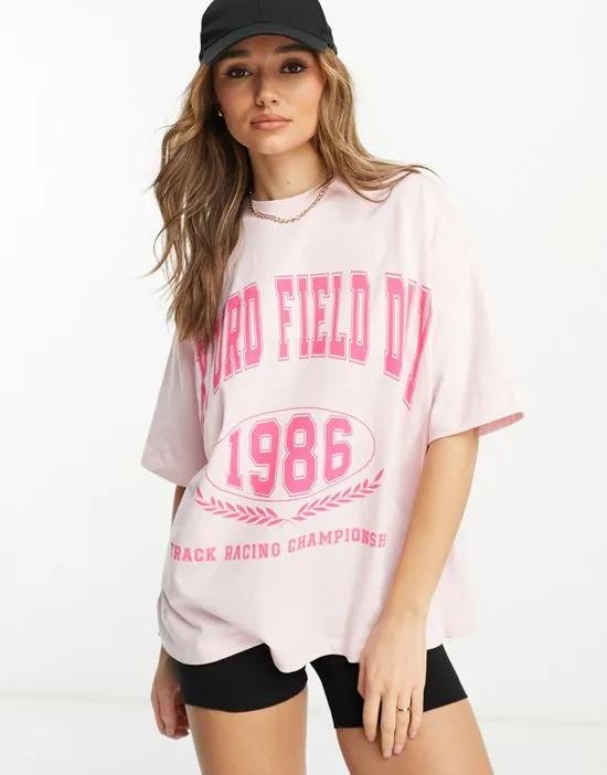 oversized T-shirt with oxford field day graphic in pink