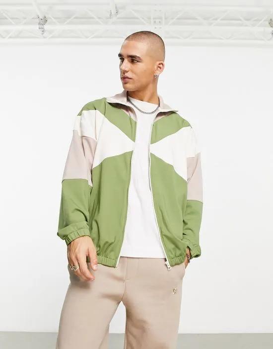 oversized track jacket in green color block
