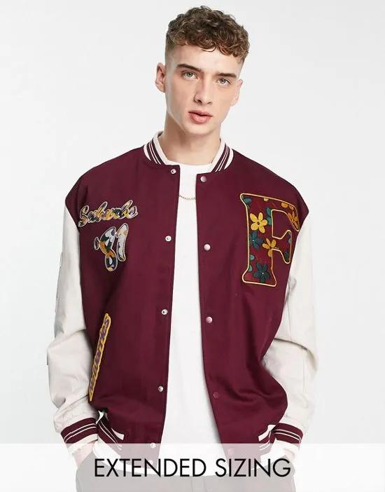 oversized varsity jacket in red with badges