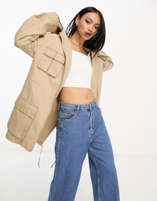 oversized washed parka with cargo pockets in sand