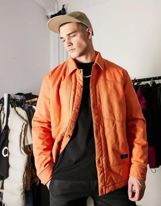 padded coach jacket with contrast stitching in orange