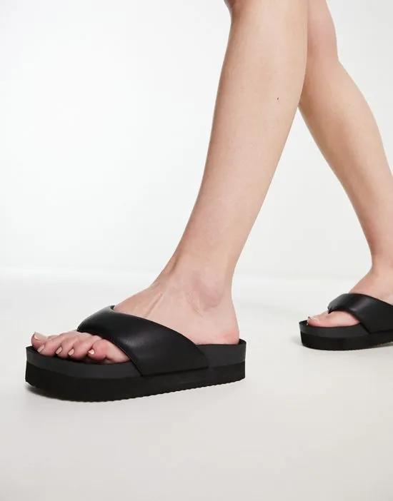 padded PU thong sandals with wide straps in black