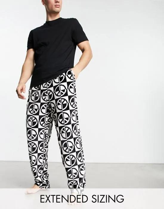 pajama set with t-shirt and pants in black with fleece printed bottom