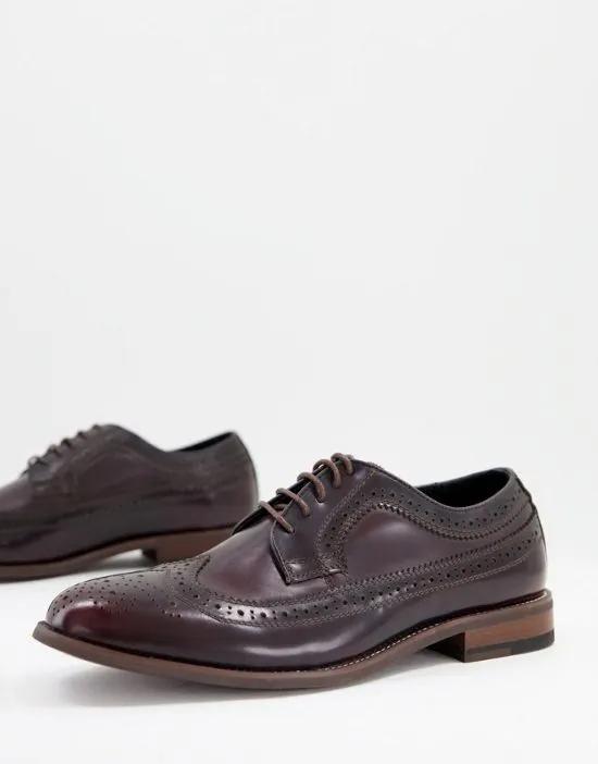 patent brogues in burnt red