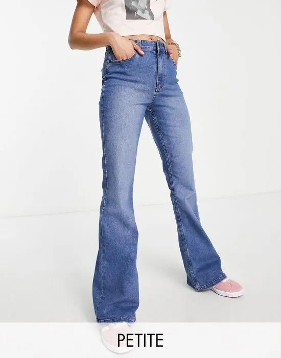 Peggy high waist flared jeans in mid blue denim