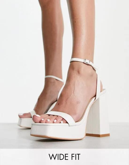platform heel sandals in white patent