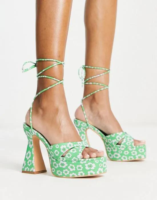 platform heeled sandals in green floral print
