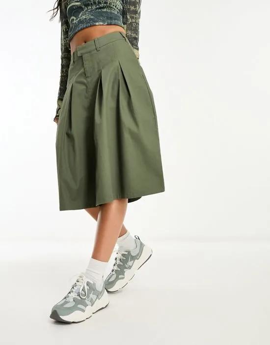 pleated knee length skirt in khaki