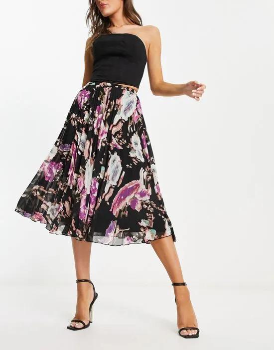 pleated midi dress in dark abstract floral