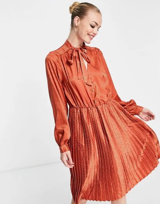pleated midi dress with neck bow detail in rust