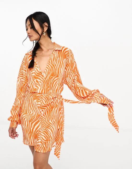 plisse wrap collared mini dress in orange zebra print
