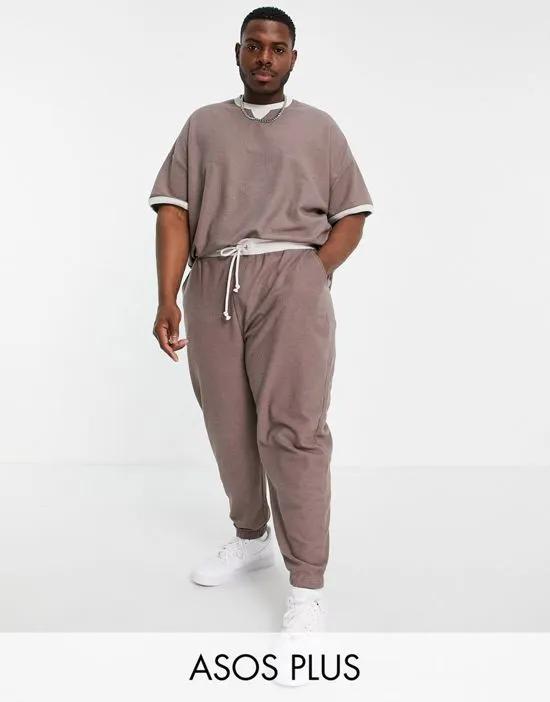 Plus coordinating oversized sweatpants in beige-brown with contrasting cream waistband
