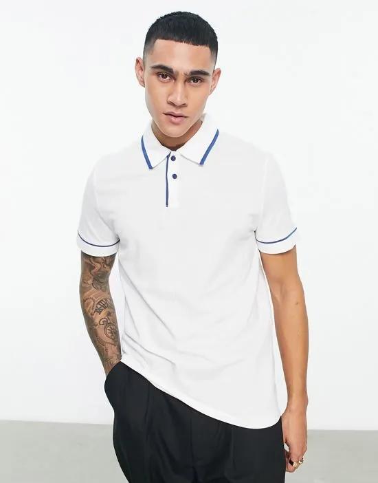 polo with revere in white with navy trims