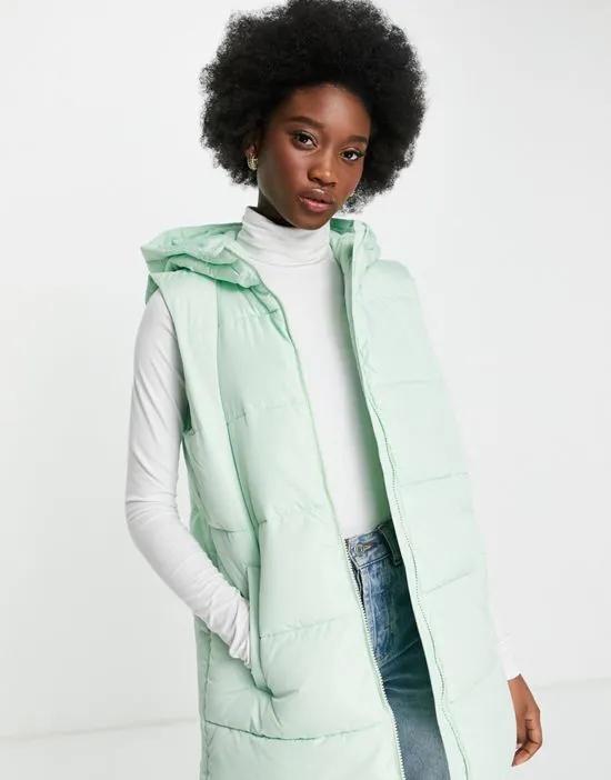 polyester padded vest with hood in pastel green - MGREEN