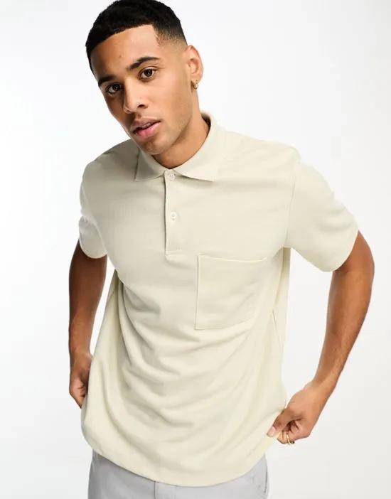 Premium textured polo with pocket in beige