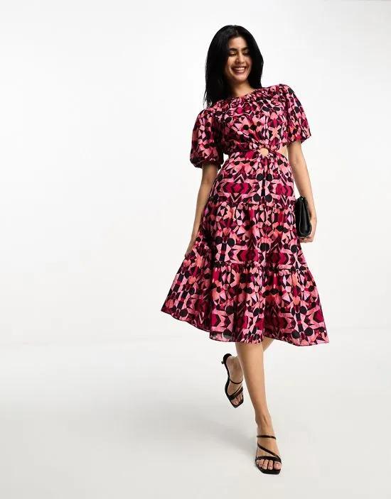 puff sleeve midi dress with ring detail cut out in pink and black geo print