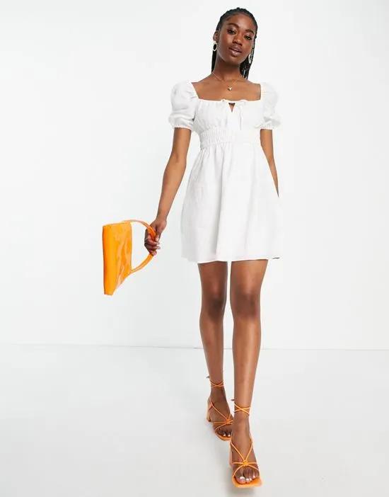 puff sleeve ruffle mini dress in white