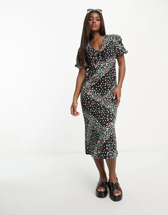 puff sleeve tie front midi dress in linear floral print