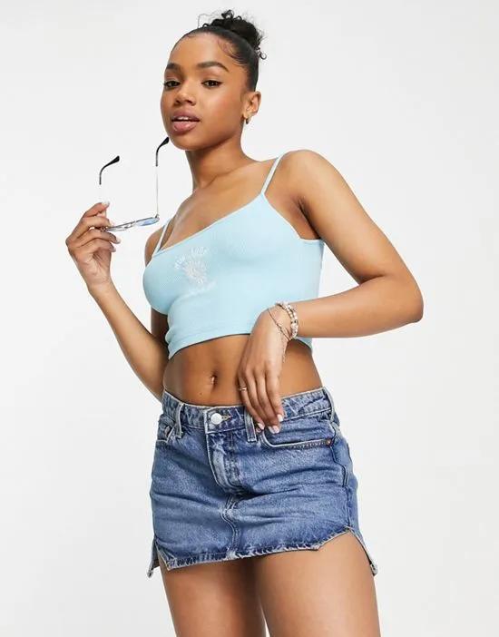 Pull&Bear strappy embroidered graphic cropped tank top in blue