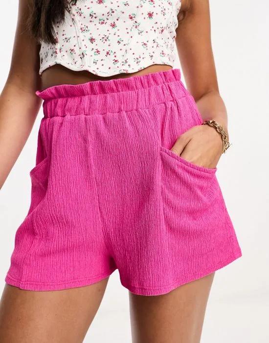 pull on short with pockets in pink