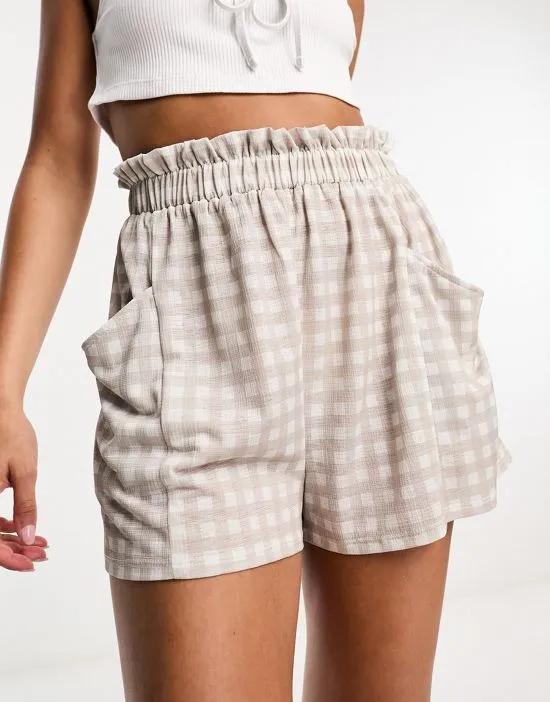 pull on short with pockets in stone gingham