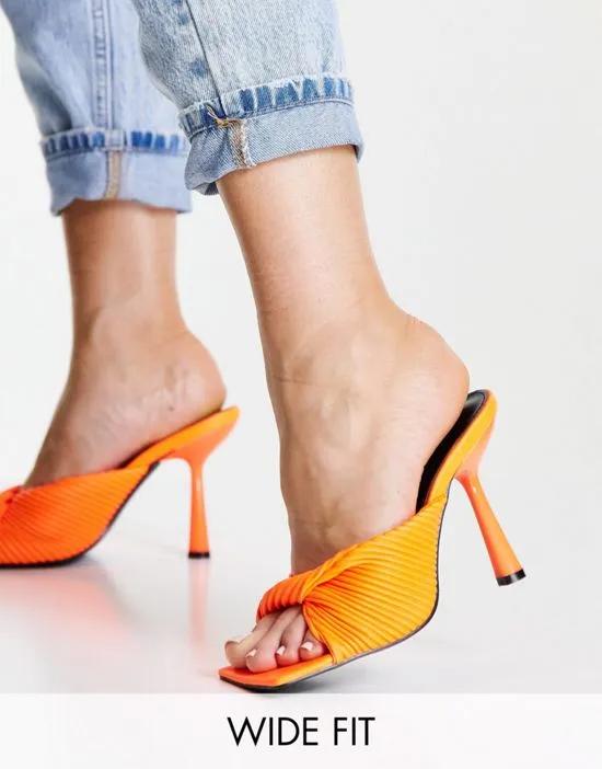 Punch heeled mules with twist strap in neon orange
