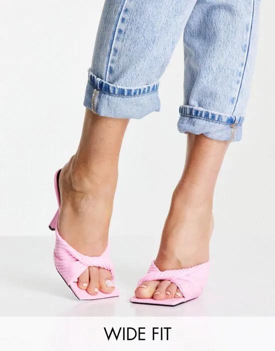 Punch heeled mules with twist strap in pink