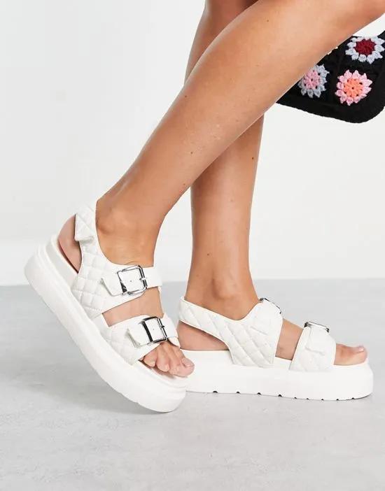 quilted buckle sandals in white