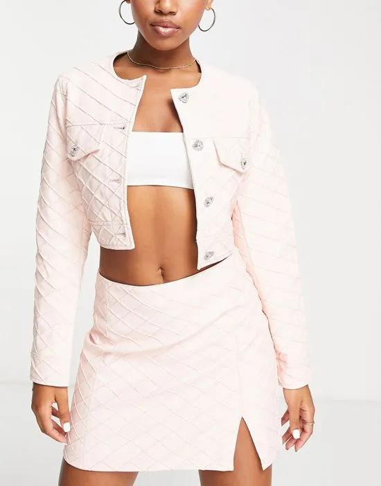 quilted faux leather mini skirt in blush