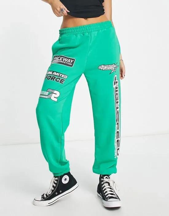 racing slogan detail cuffed sweatpants in green