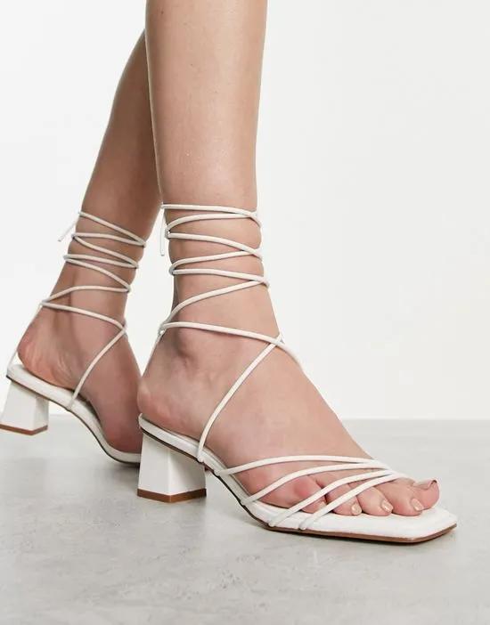 RAID Lycia strappy mid heeled sandals in white