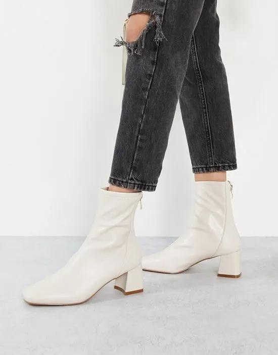 RAID Maddy mid heel sock boots in cream