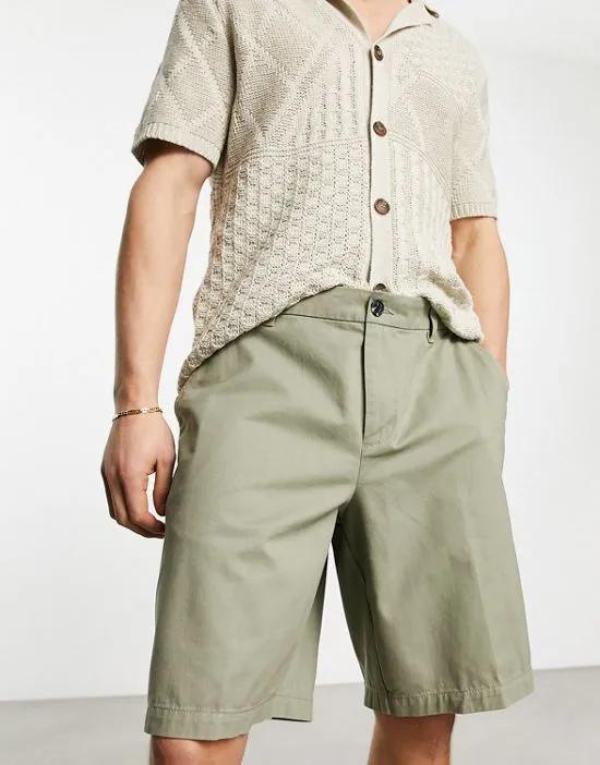 relaxed fit bermuda shorts in light green