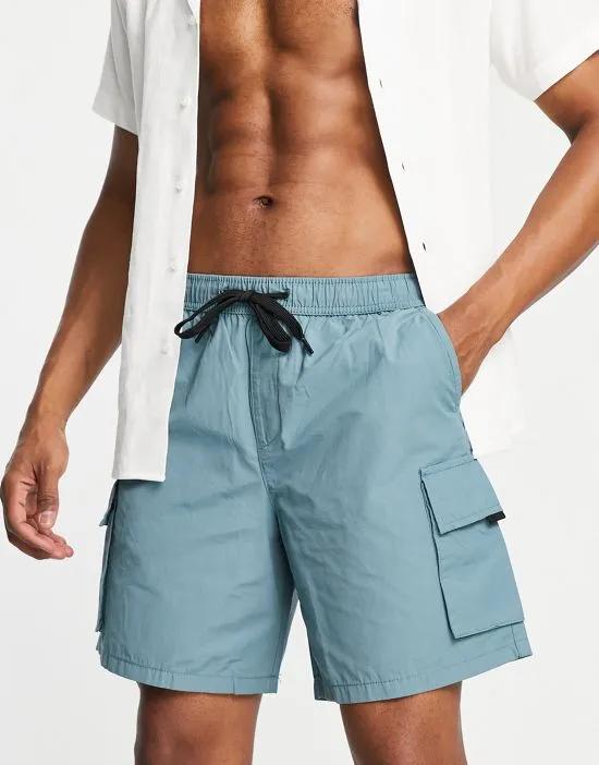 relaxed fit shorts with pockets in teal