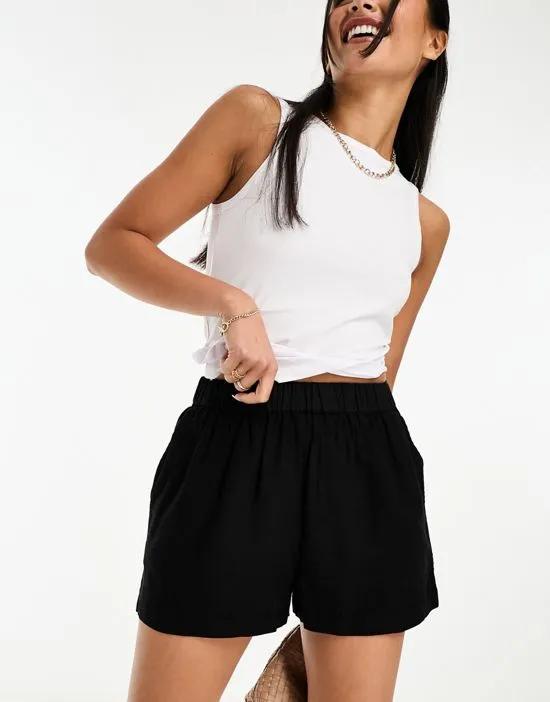 relaxed linen shorts in black