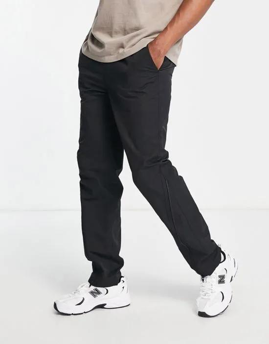 relaxed pants with zip detail in black