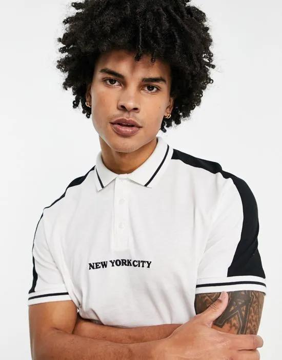 relaxed polo t-shirt in white with black shoulder panels with New York print