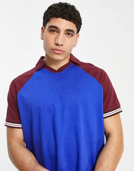 relaxed revere polo t-shirt in blue with purple raglan sleeve