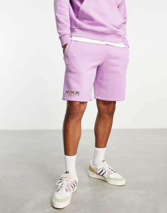 relaxed shorts in purple with text print - part of a set