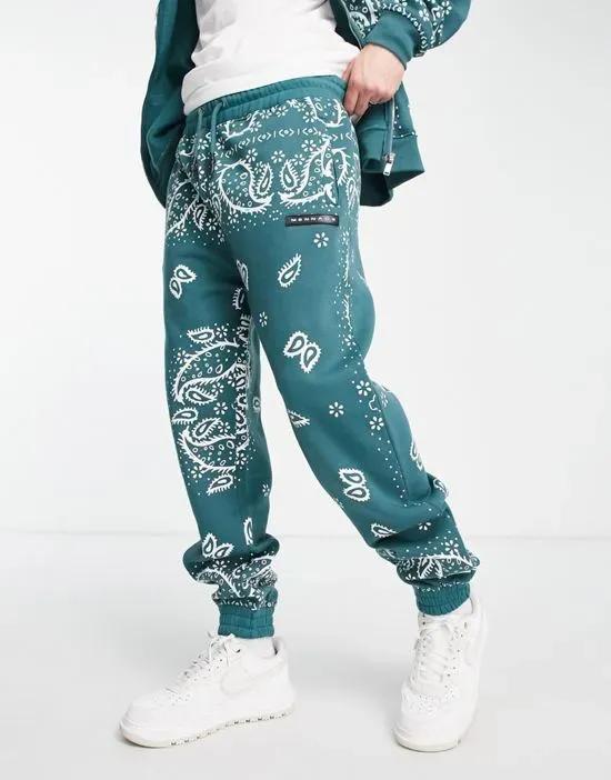 relaxed sweatpants in forest green paisley - part of a set