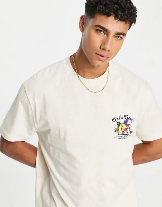 relaxed T-shirt in beige with cartoon taco chest print