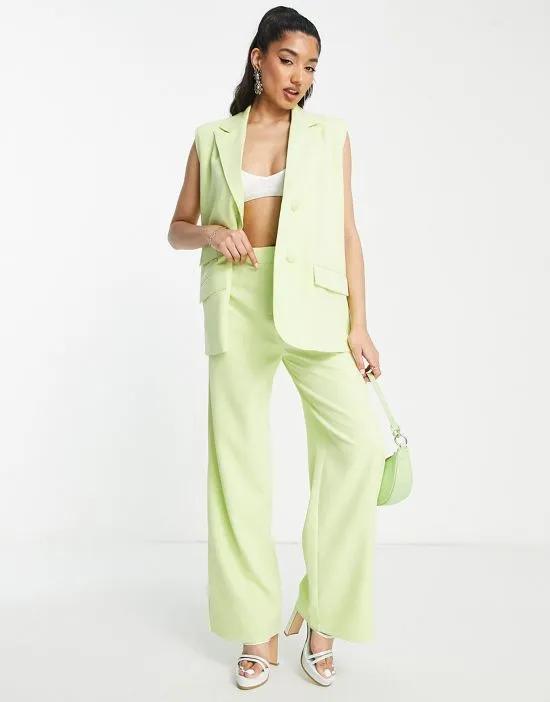 relaxed tailored pants with split hem in soft lime