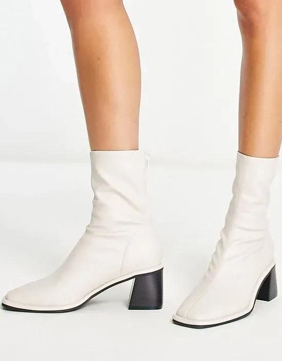 Rescue mid-heeled sock boots in off white
