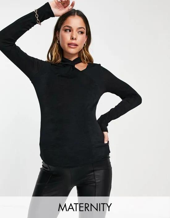 ribbed cut out twist neck top in black
