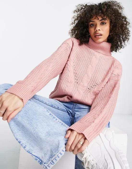 roll neck cable knit sweater in dusky pink