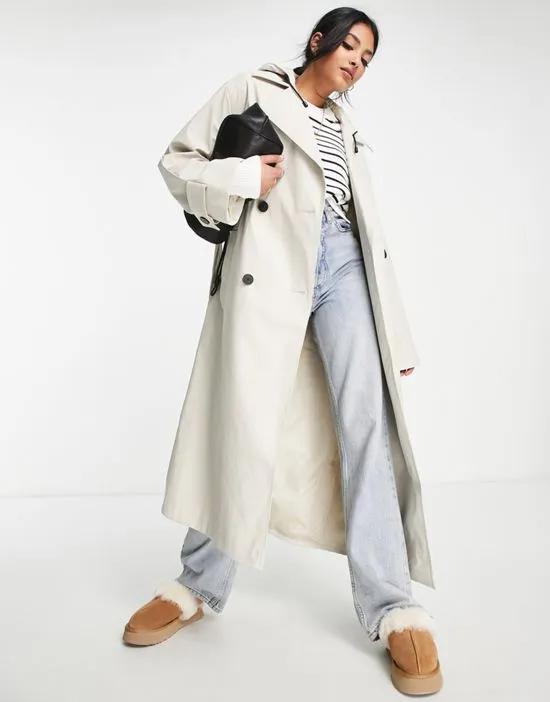 rubberized trench coat in stone