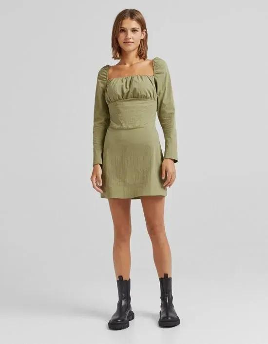 ruched bust long sleeve mini dress in green